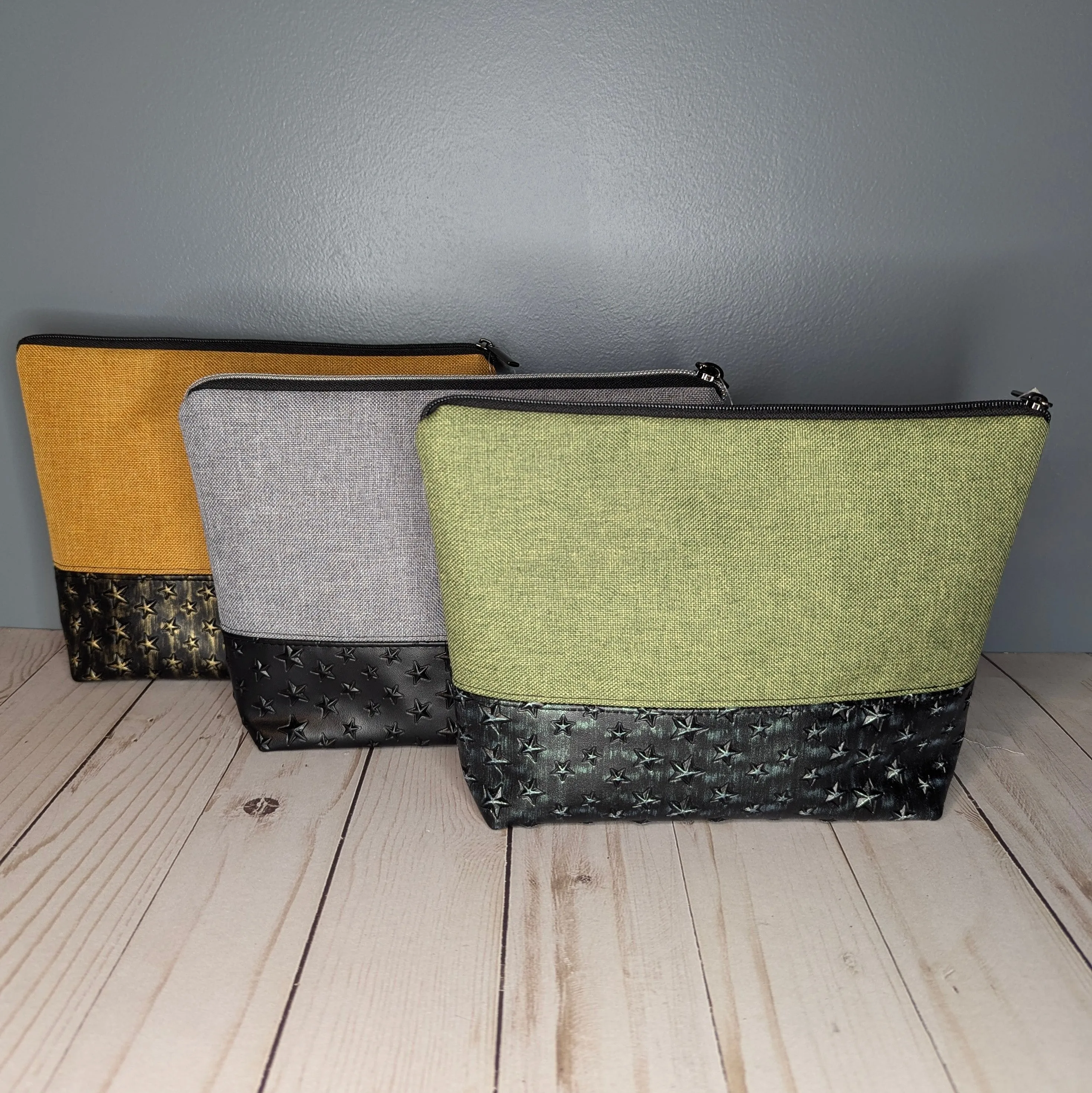 Green star studded zipper pouch