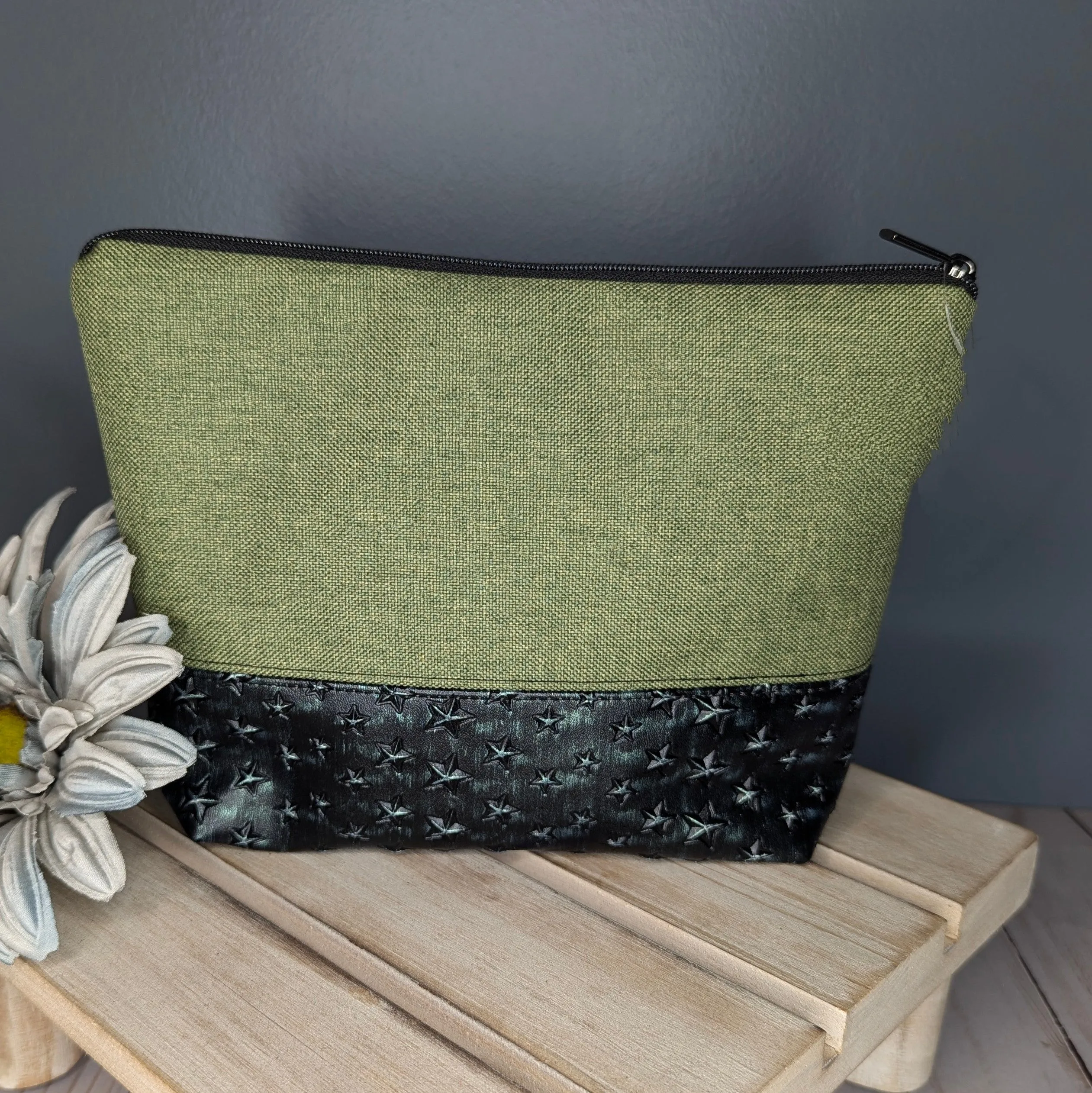 Green star studded zipper pouch