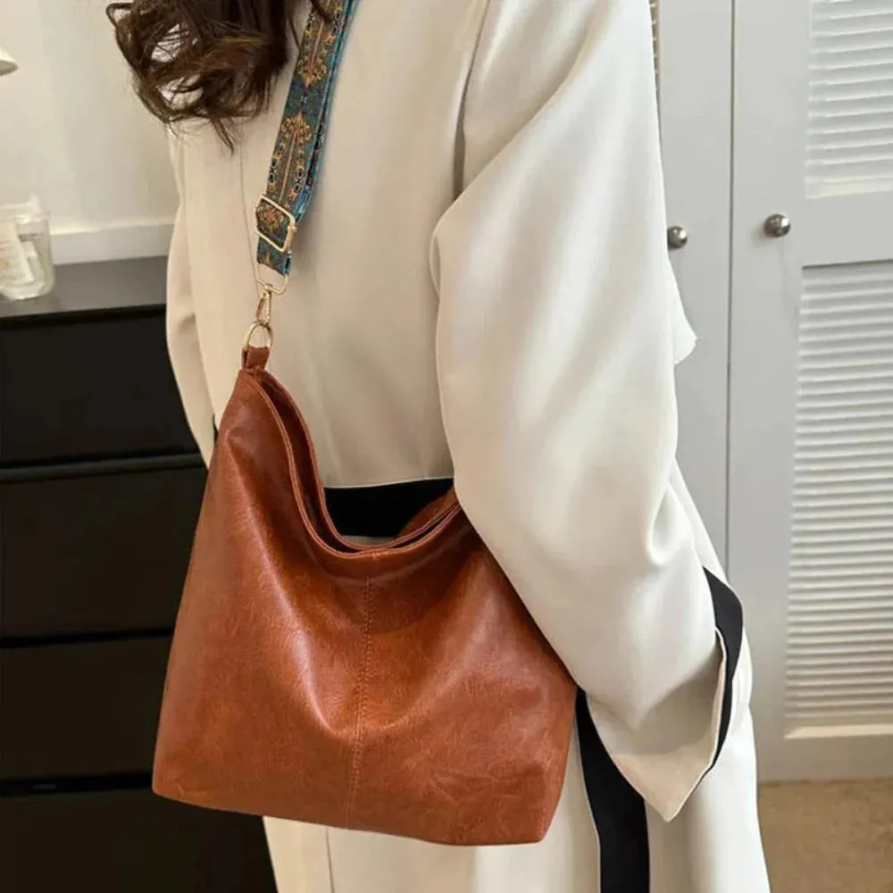 Isla’s Rustic Bloom | Artisan-Style Leather Shoulder Bag