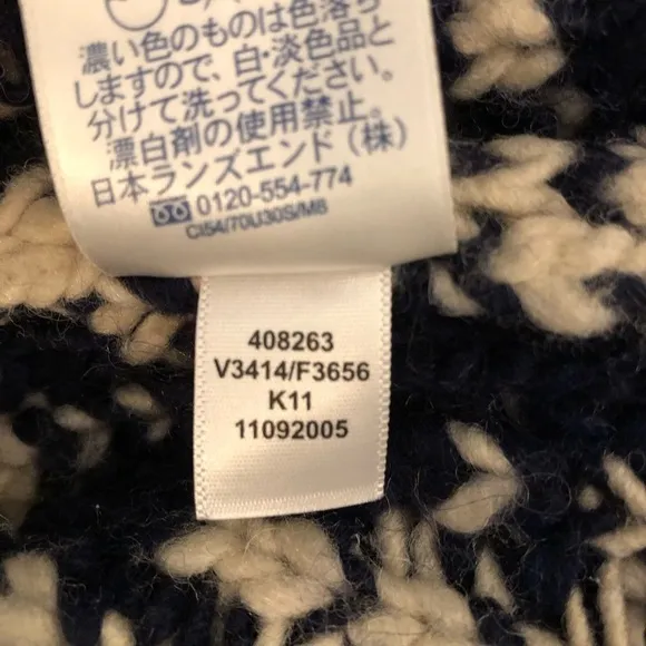 Lands End wool blend snowflake sweater women’s size medium. Blue/cream color